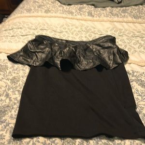 Black pencil skirt with adorable waistline. Soft and lightweight.